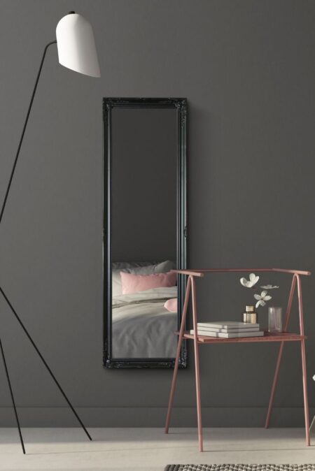 This tall ornate black mirror is available to purchase here at The Mirror Man