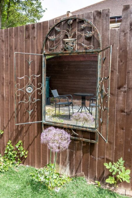 This shutter garden mirror is available to purchase here at The Mirror Man
