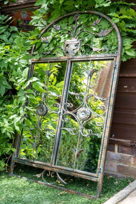 This shutter garden mirror is available to purchase here at The Mirror Man