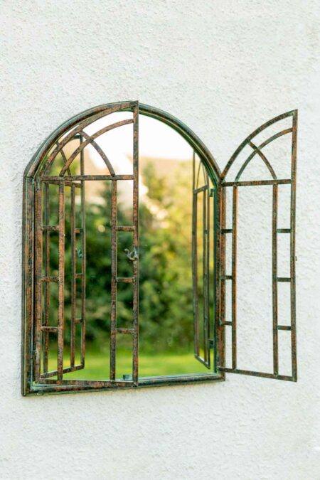 This shuttered garden mirror is available to purchase here at The Mirror Man