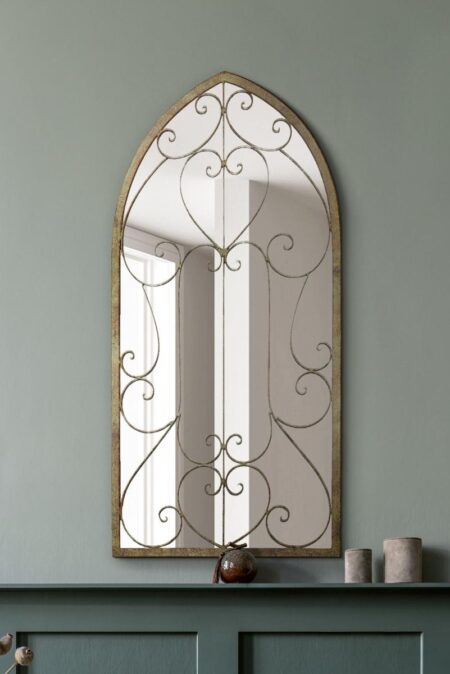 Antique Gold Arch Mirror with Scrollwork Detail – lifestyle room setting
