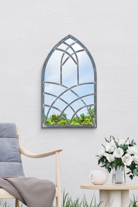 This small gothic garden mirror is available to purchase here at The Mirror Man
