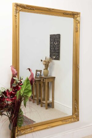 This extra large gold leaner mirror is available to purchase here at The Mirror Man