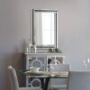 This modern accent wall mirror is available to purchase here at The Mirror Man