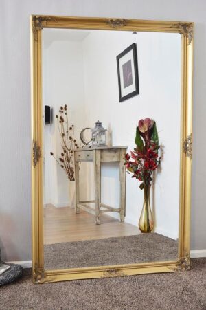 This gold classic wall mirror is available to purchase here at The Mirror Man
