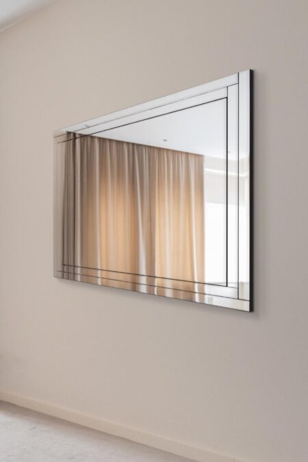This contemporary framed mirror is available to purchase here at The Mirror Man