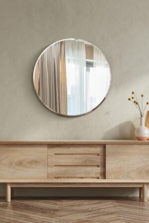 This frameless round mirror is available to purchase here at The Mirror Man