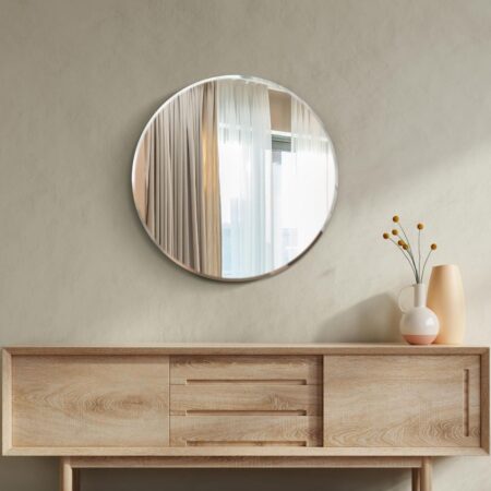 This frameless round mirror is available to purchase here at The Mirror Man