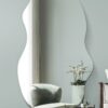This irregular wall mirror is available to purchase here at The Mirror Man