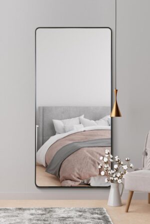 This retro wall mirror is available to purchase here at The Mirror Man